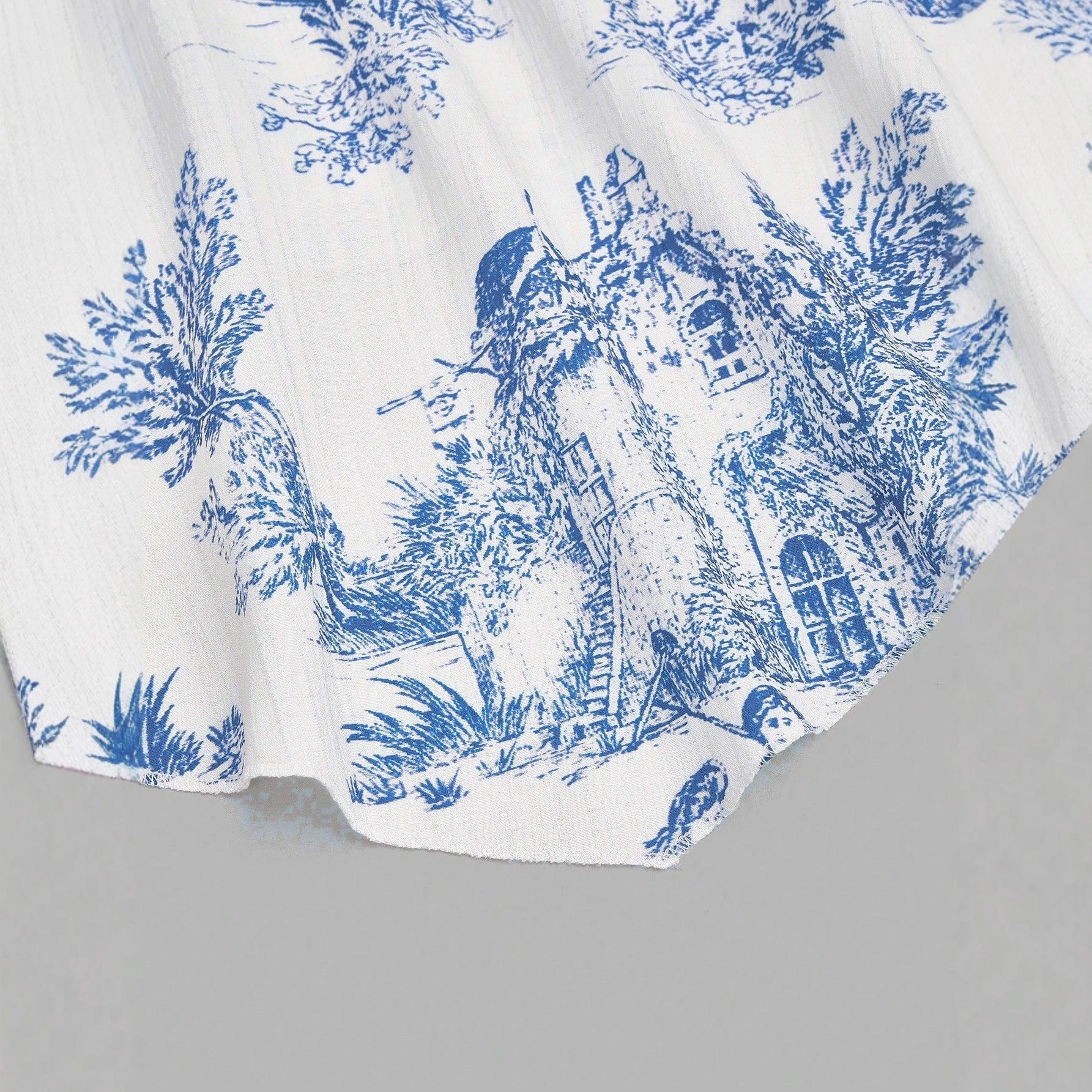 Printed Sleeveless Irregular Hem Camisole Top