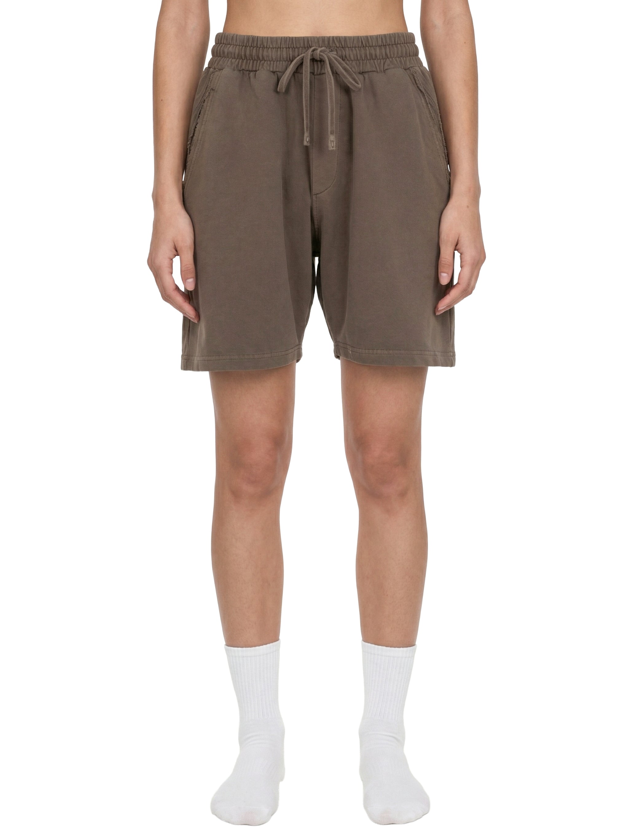Unisex Vintage Wash Raw Edge Shorts featuring a premium vintage wash finish, raw edge hem, oversized relaxed fit, breathable fabric, and modern U.S. streetwear styling by MYN2O.